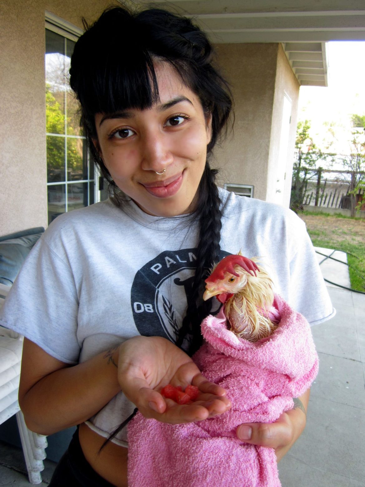 Vida Jafari and Fluke, rescued chicken from slaughterhouse